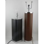A chrome and black leather table lamp,