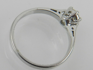 An 18 carat white gold and solitaire diamond ring, the stone of approx. 0.35 carats. - Image 2 of 2