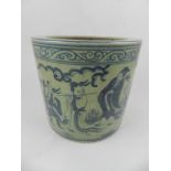 A Chinese blue and white hard paste porcelain brush pot, decorated with figures in landscape scene.