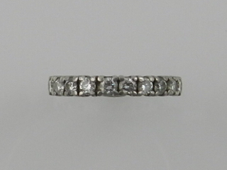 A platinum and diamond set eternity ring, the stones of approx. 2.0 carats combined, size M.