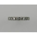 A platinum and diamond set eternity ring, the stones of approx. 2.0 carats combined, size M.