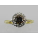 An 18 carat yellow gold and diamond cluster ring,