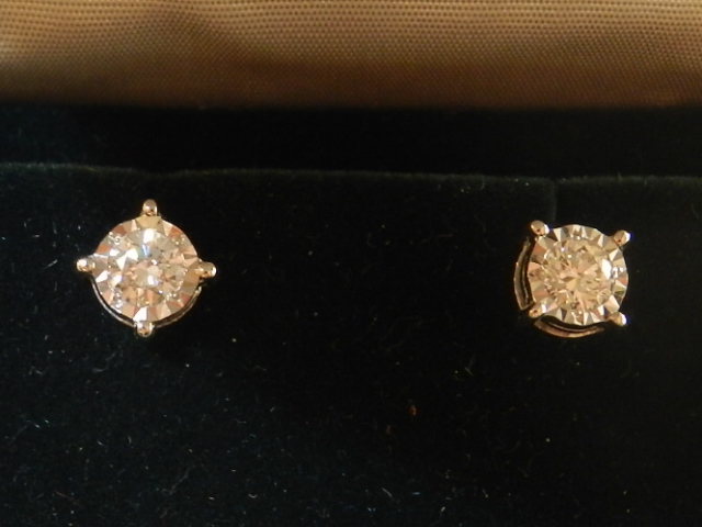 A pair of 18ct white gold solitaire diamond ear studs, total weight 0.36ct.