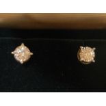 A pair of 18ct white gold solitaire diamond ear studs, total weight 0.36ct.