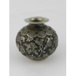 "WITHDRAWN" A Persian white metal inkwell, decorated with flowers, foliage and birds,