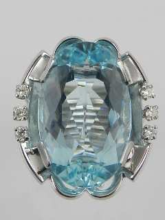 An unusual white metal, diamond, and aquamarine cocktail ring,