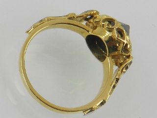 An unusual yellow metal and black diamond ring, the inverted stone of approx. 1. - Image 2 of 2