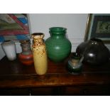Three West German pottery vases, together with two other Continental pottery vases, signed.