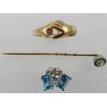 A yellow metal tie pin, stamped 375, together with a pair of white metal and blue stone earrings,