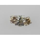 A pair of 18 carat white gold and collet set diamond stud earrings, the stones of approx. 0.