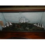 A cased study of model ships at sea.