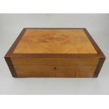 A satinwood cigar humidor, mahogany cross-banded, with a maple wood interior.