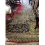 A North West Persian carpet, having quatrefoil medallion to centre, on a floral ground,