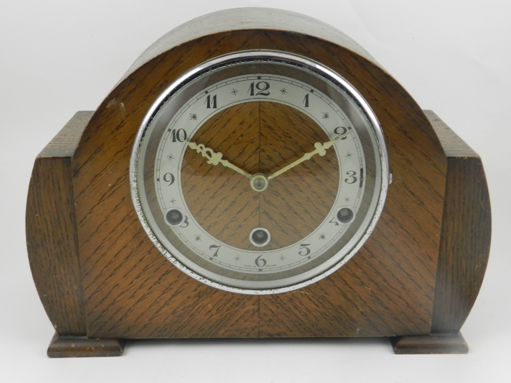 A 1930s Art Deco oak mantle clock.