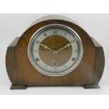 A 1930s Art Deco oak mantle clock.