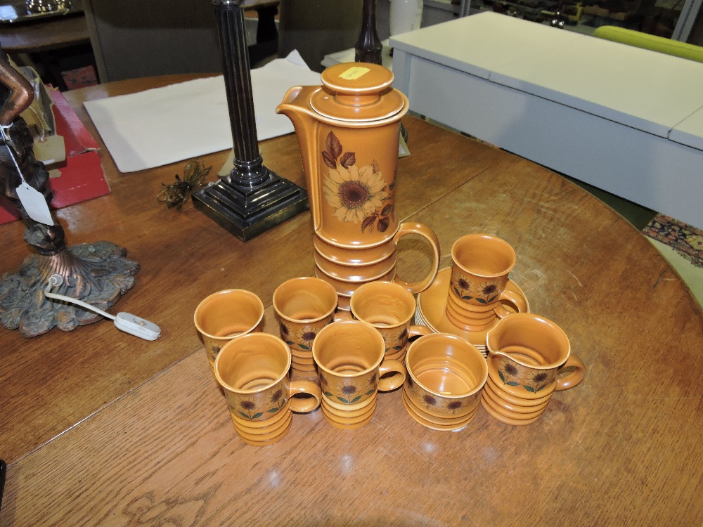 A Carltonware coffee service for six place settings, including coffee jug, sucriere, milk jug,
