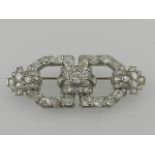 A French Art Deco period platinum and diamond set brooch, the old cut stones of approx.