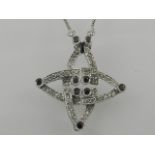 An unusual 18 carat white gold and diamond set 'Metamorphoses' necklace,