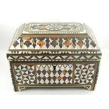 A 19th century Turkish mother of pearl and tortoise shell inlaid box, of trapezium dome form. H.