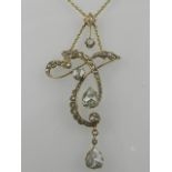 An unusual yellow metal and diamond set drop pendant, possibly Russian,