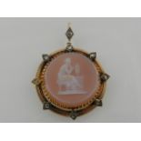 A yellow metal, diamond, and hardstone cameo set pendant,