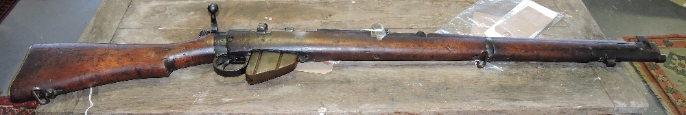 An Enfield No. 1 Mk.3 military issue rifle, dated 1955, number 44297, bored to take a .