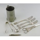 A small quantity of platedware including grape scissors and sugar tongs,