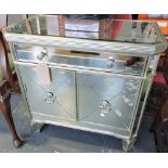 A Palace style mirrored side cabinet fitted drawer over cupboard base, W. 76cm.