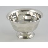 A silver sugar bowl, Emile Viner, Sheffield 1931, circular of faceted form,
