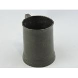 A Victorian pewter pint tankard, the base engraved orange tree,