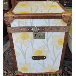 A pair of vintage style tan leather mounted steamer trunks with daffodil printed panels, W. 40cm.