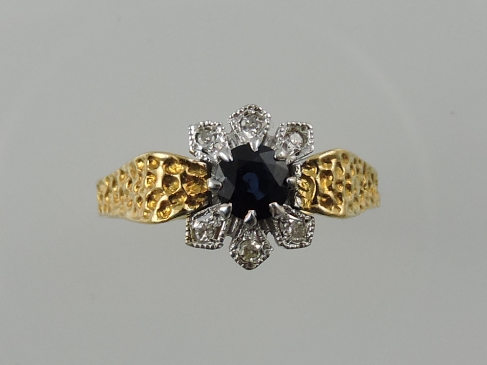 A sapphire and diamond dress ring,