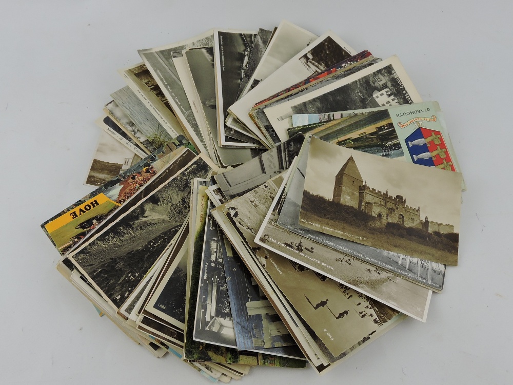 A collection of black and white, polychrome and sepia postcards, mainly UK views with some European.