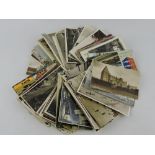 A collection of black and white, polychrome and sepia postcards, mainly UK views with some European.
