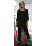 A lifesize promotional standing card cutout of Sarah Michelle Geller as Buffy The Vampire Slayer.