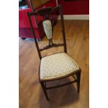 A pair of Edwardian mahogany and upholstered salon chairs, the backs with upholstered pads, (2).