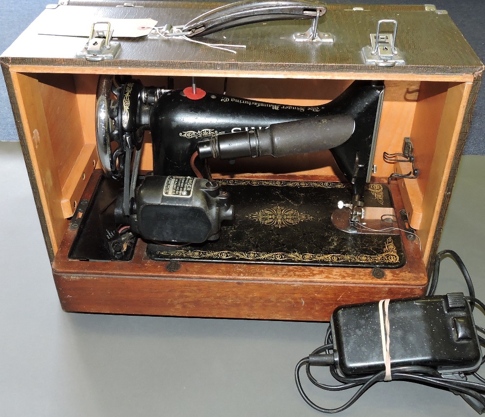 Singer sewing machine, circa 1951, in an associated fitted carry case.