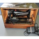 Singer sewing machine, circa 1951, in an associated fitted carry case.