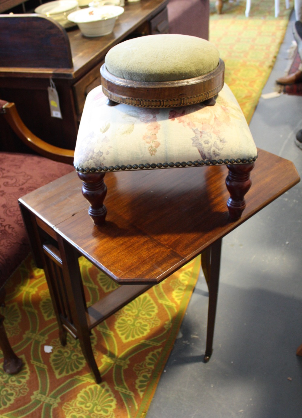 An Edwardian mahogany Sutherland table;