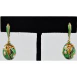 A pair of Russian gilt lily of the valley ear pendants, with vivid green enamel and set with pearls,