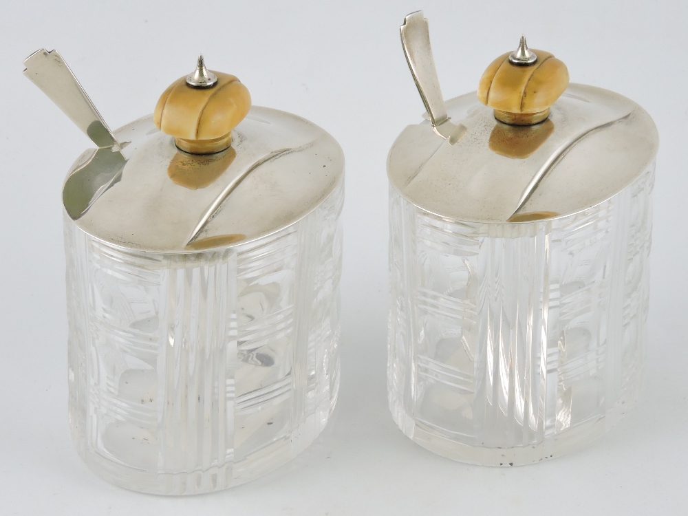 A pair of George VI oval cut glass preserve jars, Mappin & Webb, Sheffield 1936/37,