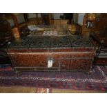 An unusual late 17th / 18th century Continental brown leather and brass studded mule chest,