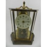 An anniversary mantel timepiece, having woven enamel dial with set cylinder movement. signed Kundo,.