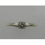 An 18ct white gold solitaire diamond ring, set with a brilliant cut stone of approx. 0.25ct.