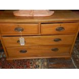 An early 20th century pine chest of drawers, having two short over two long drawers. H.72cm W.