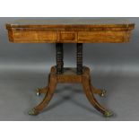 A Regency rosewood card table, satinwood cross-banded, the hinged top enclosing a green baise