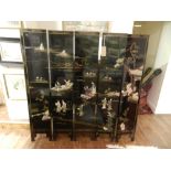 A Chinese shyvana decorated black lacquered five fold screen,