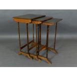 A nest of three brass inlaid quarter veneered rosewood tables, raised on gun barrel turned legs