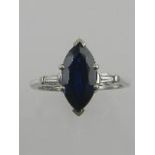 An Art Deco style white metal sapphire and diamond dress ring,