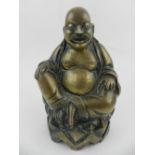 A bronze figure of a Buddha, bears character mark to back.